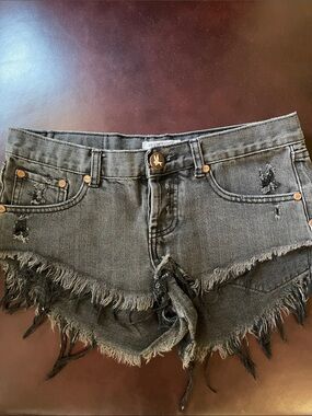 Distressed Black Denim Cutoff Shorts